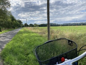 A Blissful Bike Ride Under the Cloudy Blue Sky 🚴🏾